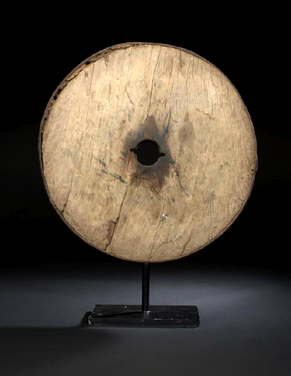 Appraisal: Chinese Iron-Bound Cart Wheel th century the slightly convex wooden