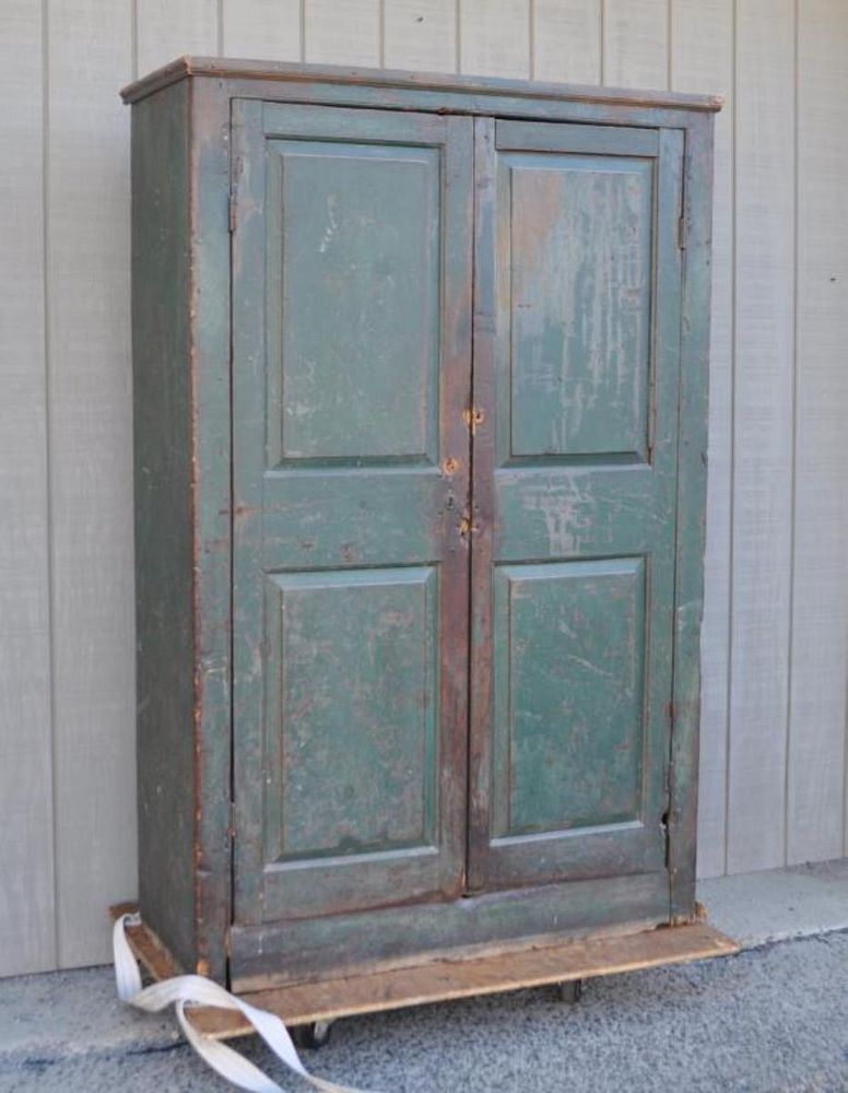 Appraisal: Country Primitive American Wall Cupboard in green paint with two