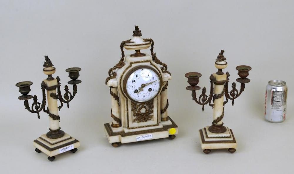 Appraisal: French Gilt Bronze Marble Clock Garniture French gilt bronze and