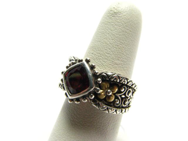 Appraisal: Silver K Yellow Gold Designer Ring With Garnet ring has