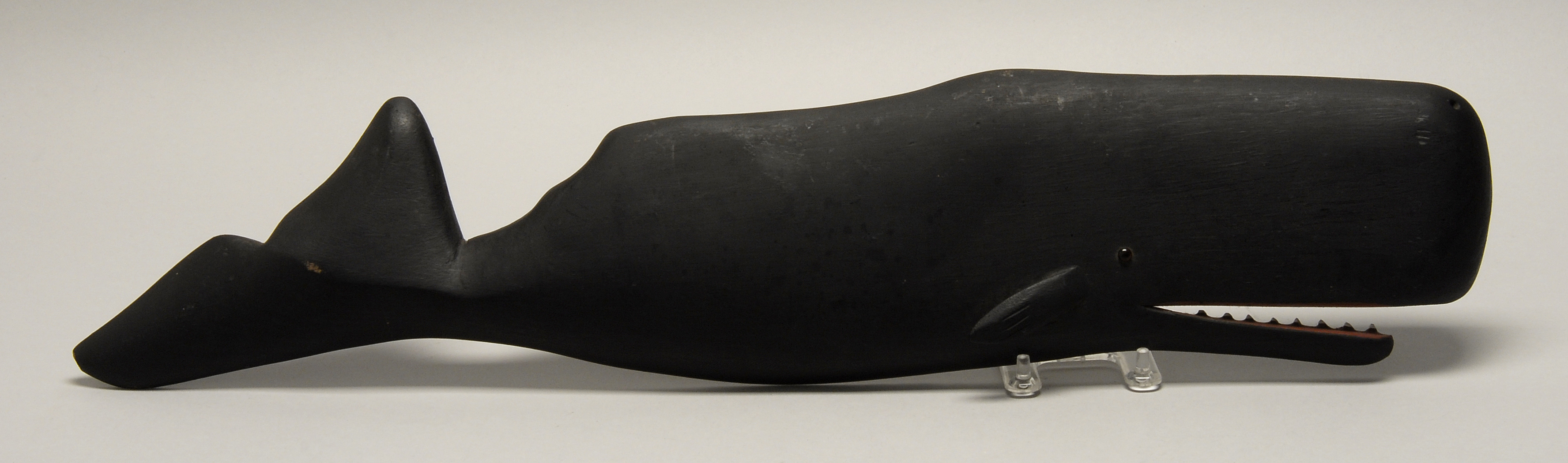 Appraisal: WOODEN CARVING OF A WHALE th CenturyWith a glass eye