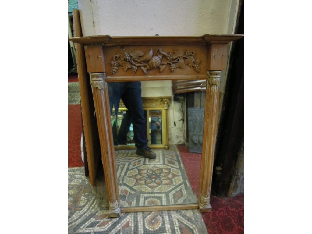 Appraisal: A th century pier glass with stripped pine frame enclosing