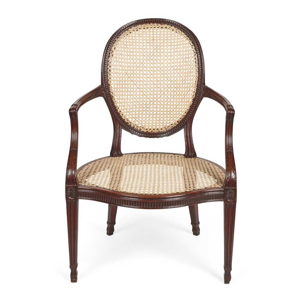 Appraisal: GEORGE III MAHOGANY AND CANED ARMCHAIR IN THE MANNER OF