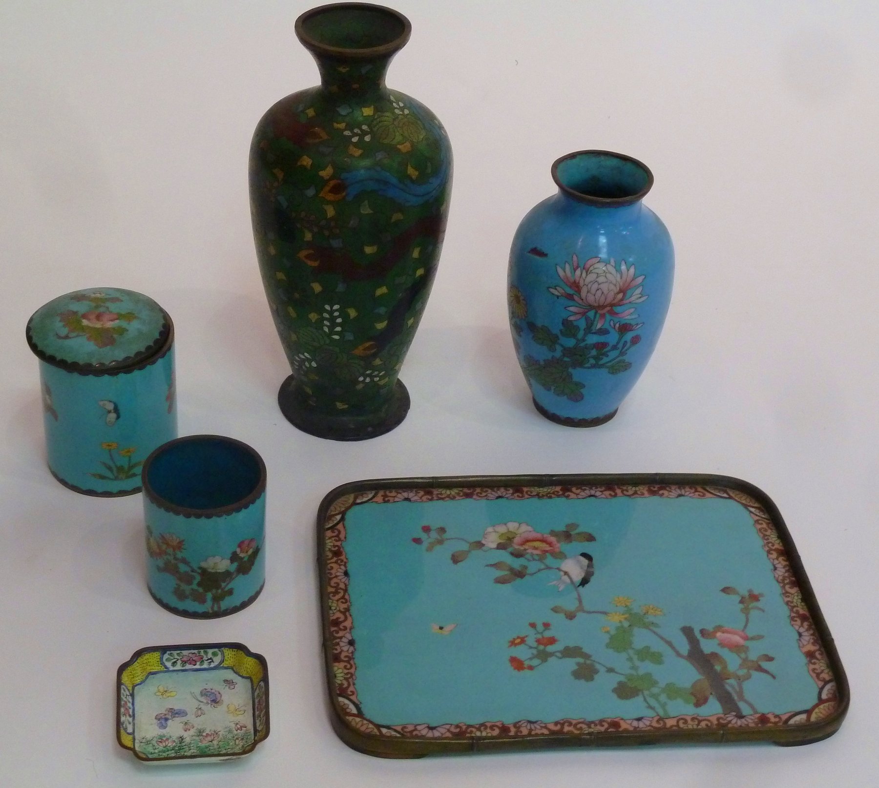 Appraisal: A cloisonn enamel tray and two jars decorated birds in