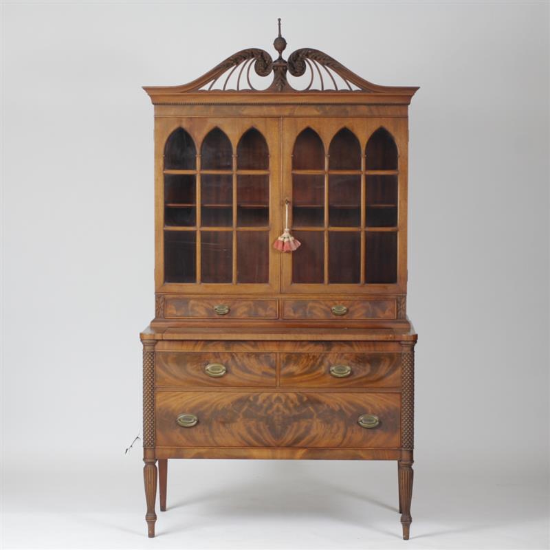 Appraisal: Diminuitive Sheraton style step back hutch with glass doors scroll