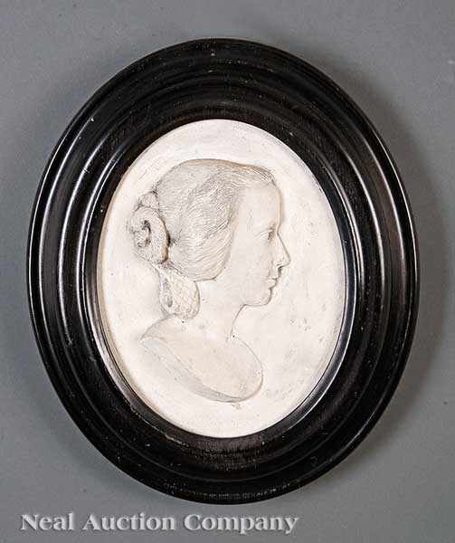 Appraisal: A Plaster Relief of a Young Woman with an Elaborate