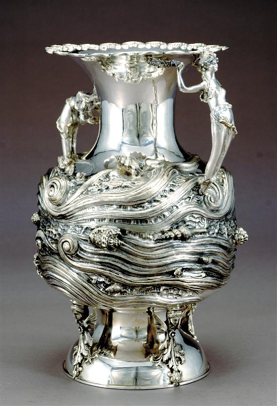 Appraisal: Impressive sterling urn flared rim with scalloped edge decorated in