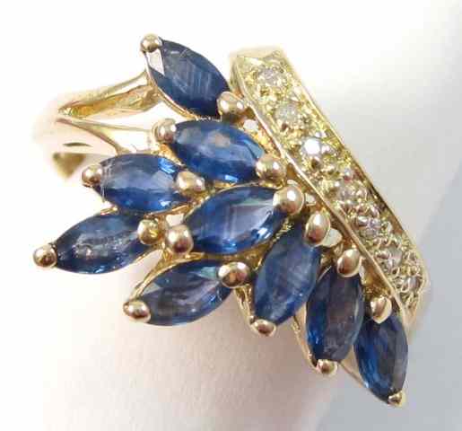 Appraisal: SAPPHIRE DIAMOND AND YELLOW GOLD RING k gold set with