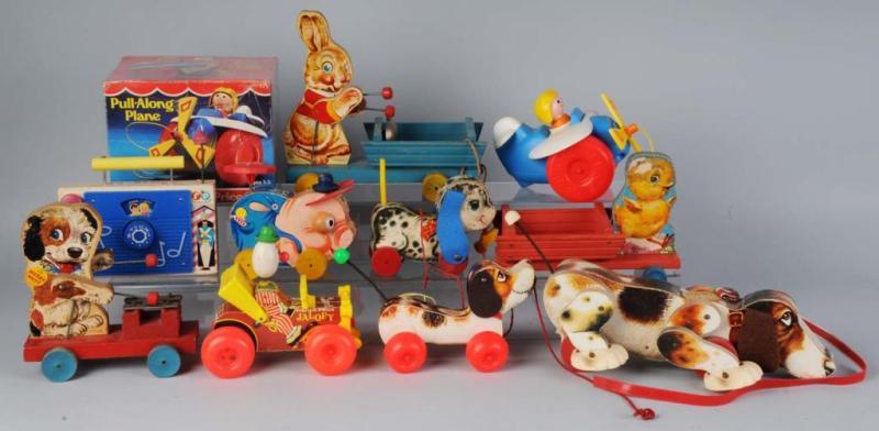 Appraisal: Lot of Fisher-Price Toys Description Paper-on-wood and plastic Includes Pull