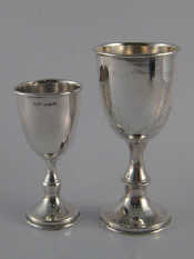 Appraisal: Two silver kiddush cups one London ht cm one London