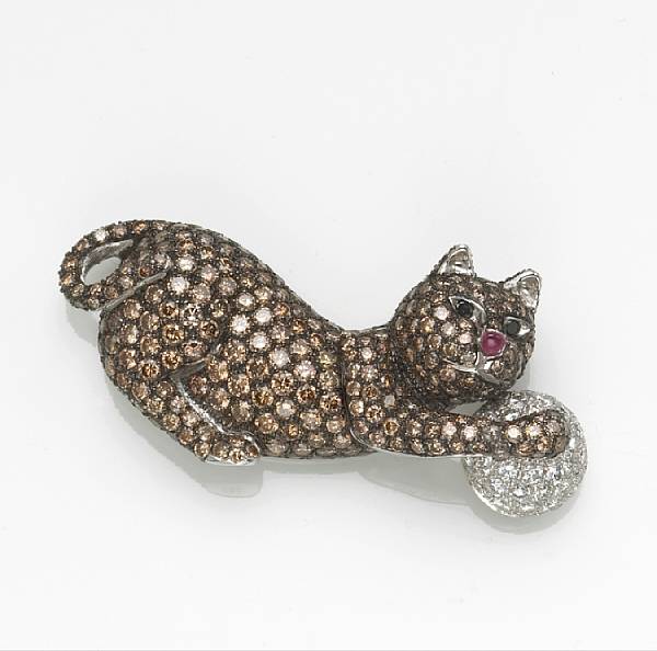 Appraisal: A colored diamond diamond ruby and k white gold cat