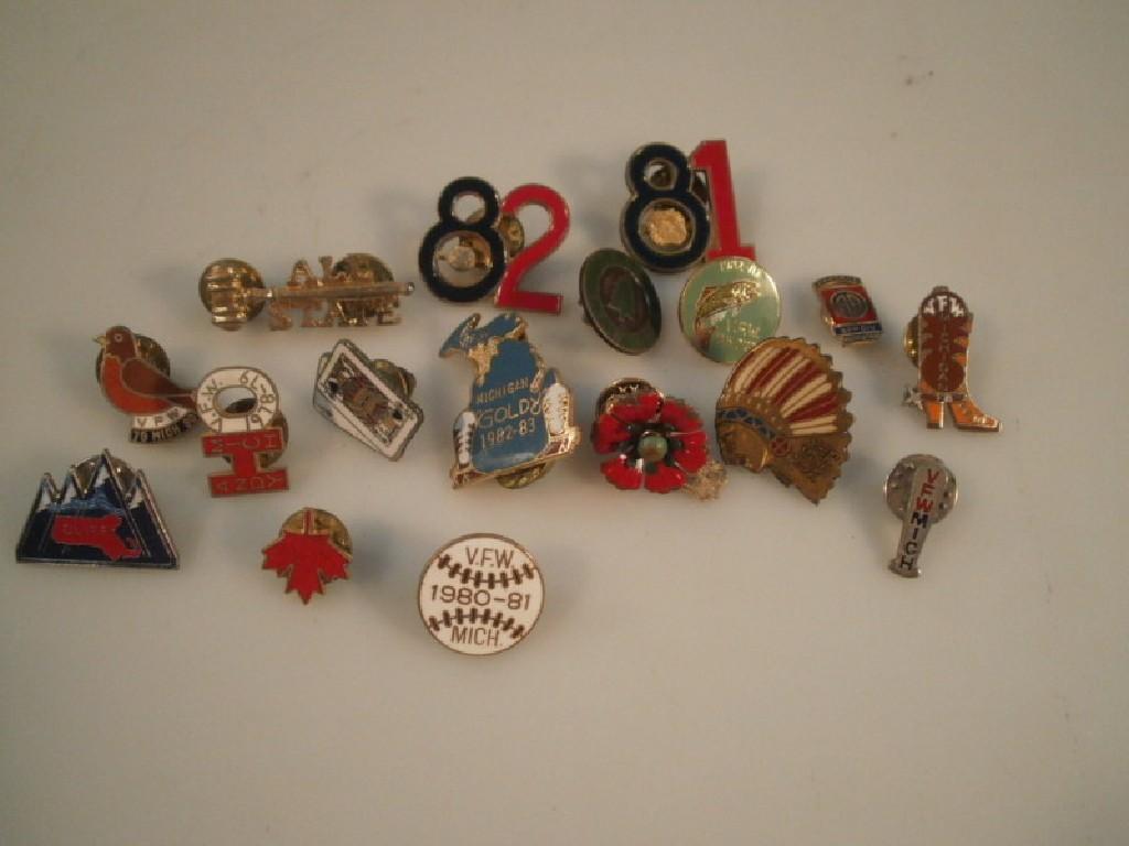 Appraisal: A collection of United Stated US VFW cap lapel badges