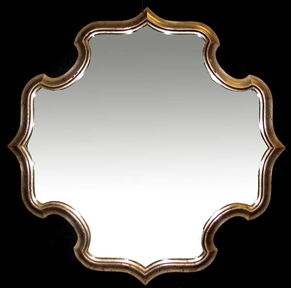 Appraisal: A Continental silvered wood mirror of shaped outline height in