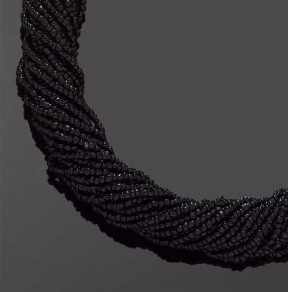 Appraisal: BLACK CORAL NECKLACE TORSADE Fastener gold-plated silver -row necklace of