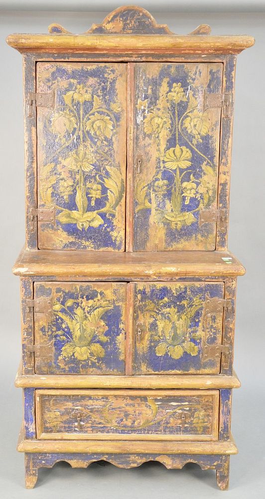 Appraisal: Primitive paint decorated cupboard having two over two doors over