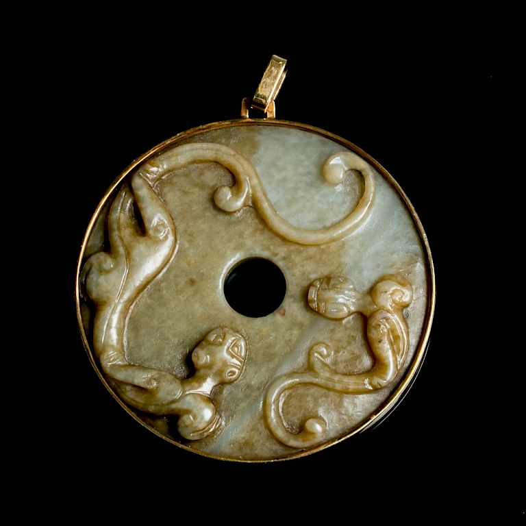 Appraisal: K MOUNTED OLIVE JADE 'DRAGON' BI DISC TH C The