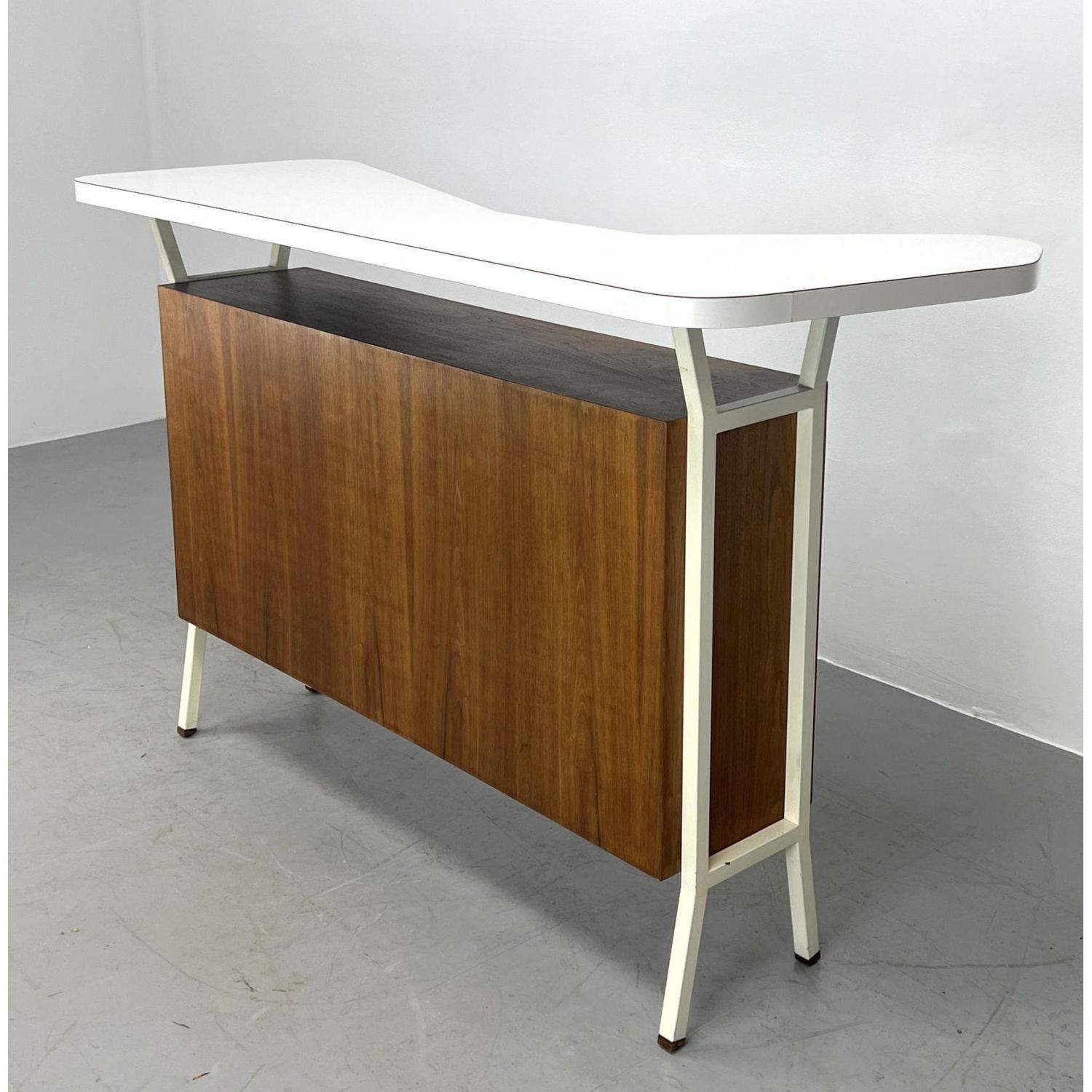 Appraisal: s Modern Biomorphic Walnut Laminate and Masonite Bar Dimensions H