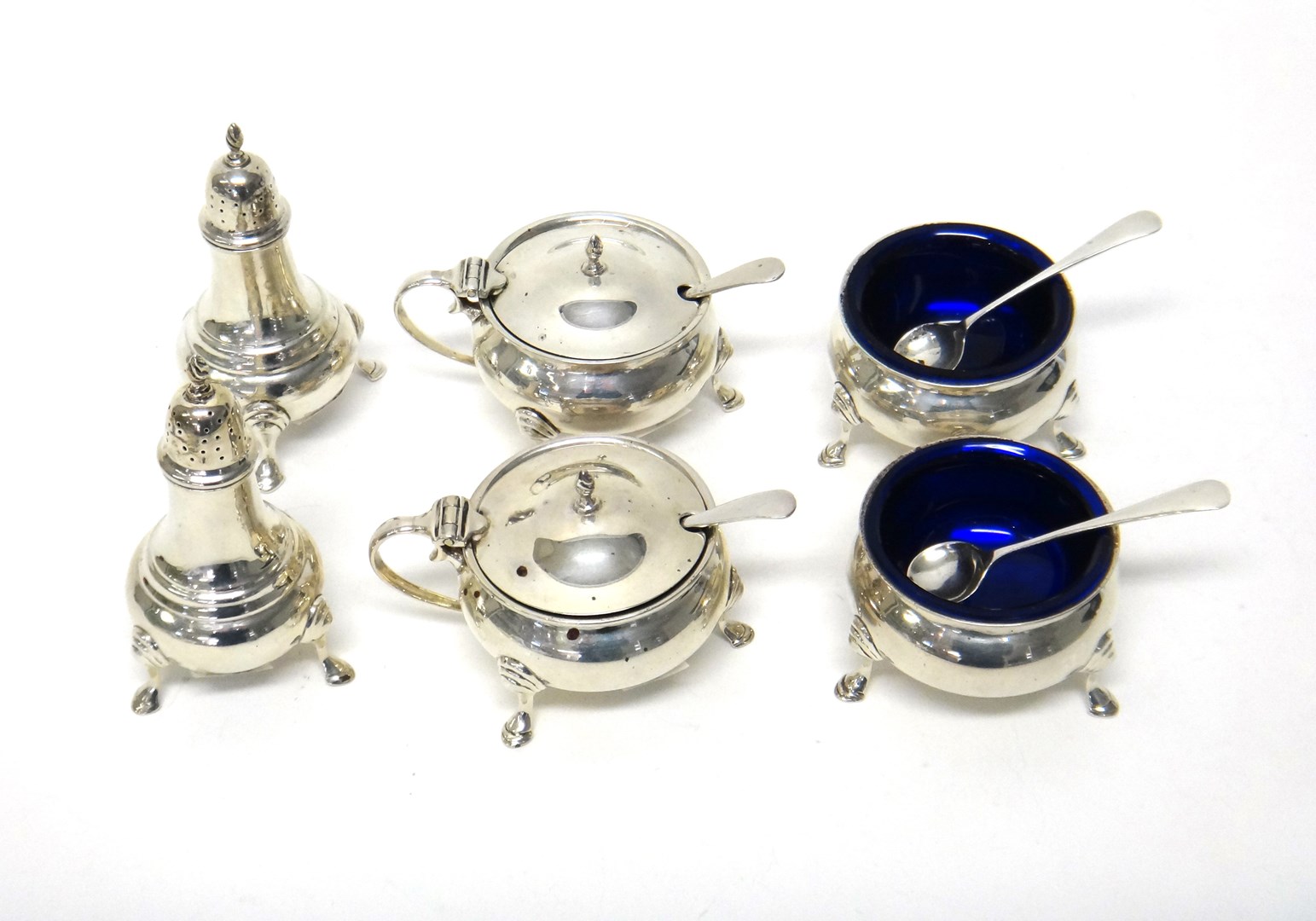 Appraisal: A silver six piece condiment set comprising a pair of