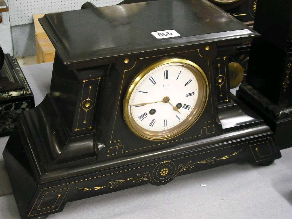 Appraisal: Black slate two train mantel clock the movement back plate