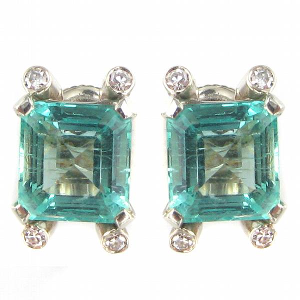 Appraisal: A pair of emerald diamond and white gold ear studs