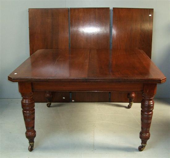 Appraisal: Edwardian walnut dining table on turned legs with three leaves