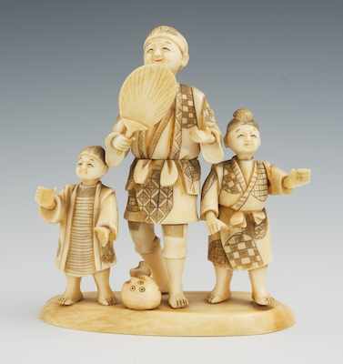 Appraisal: Another Carved Ivory Figural Group Depicting a woman holding a