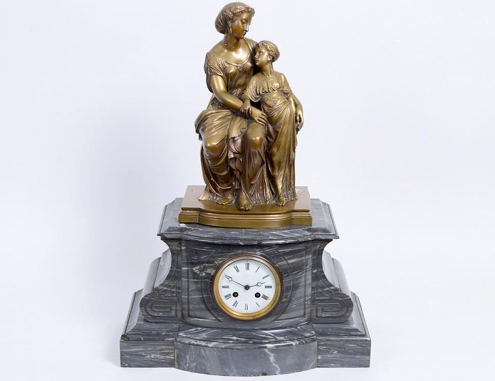 Appraisal: FRENCH PATINATED BRONZE MARBLE CLOCK Late th century The shaped