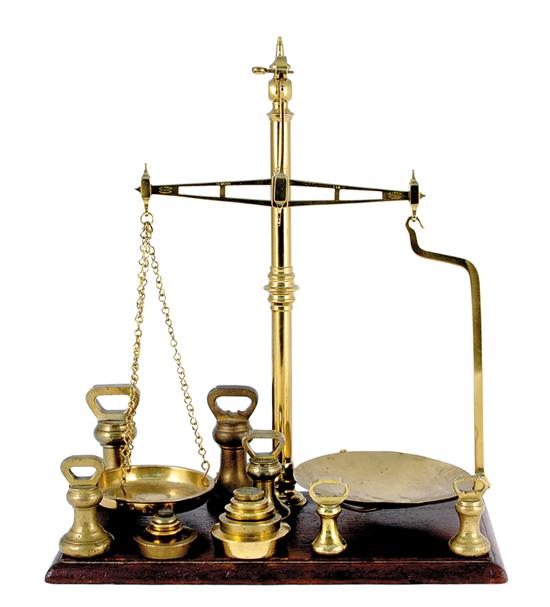 Appraisal: English brass scale and weights circa scale mounted on mahogany