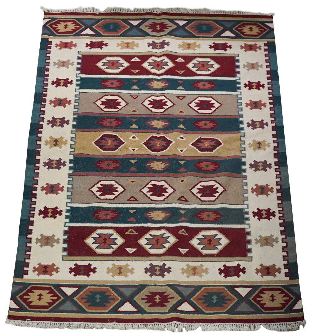 Appraisal: BEIGE BLUE RED DHURRI RUGwool Condition moth damage and scattered