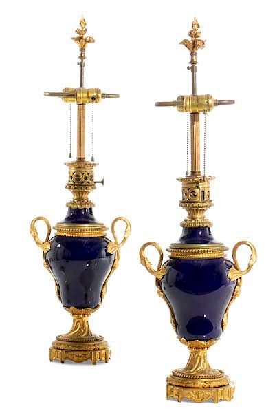 Appraisal: Pair Louis XV style bronze and porcelain lamps A pair