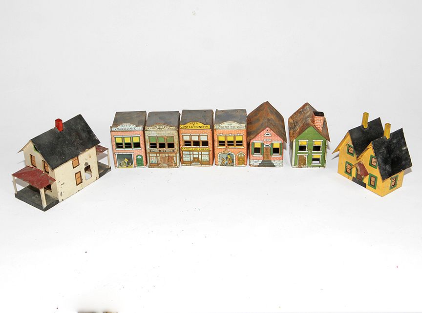 Appraisal: Tin Toy Buildings A group of eight assorted buildings with