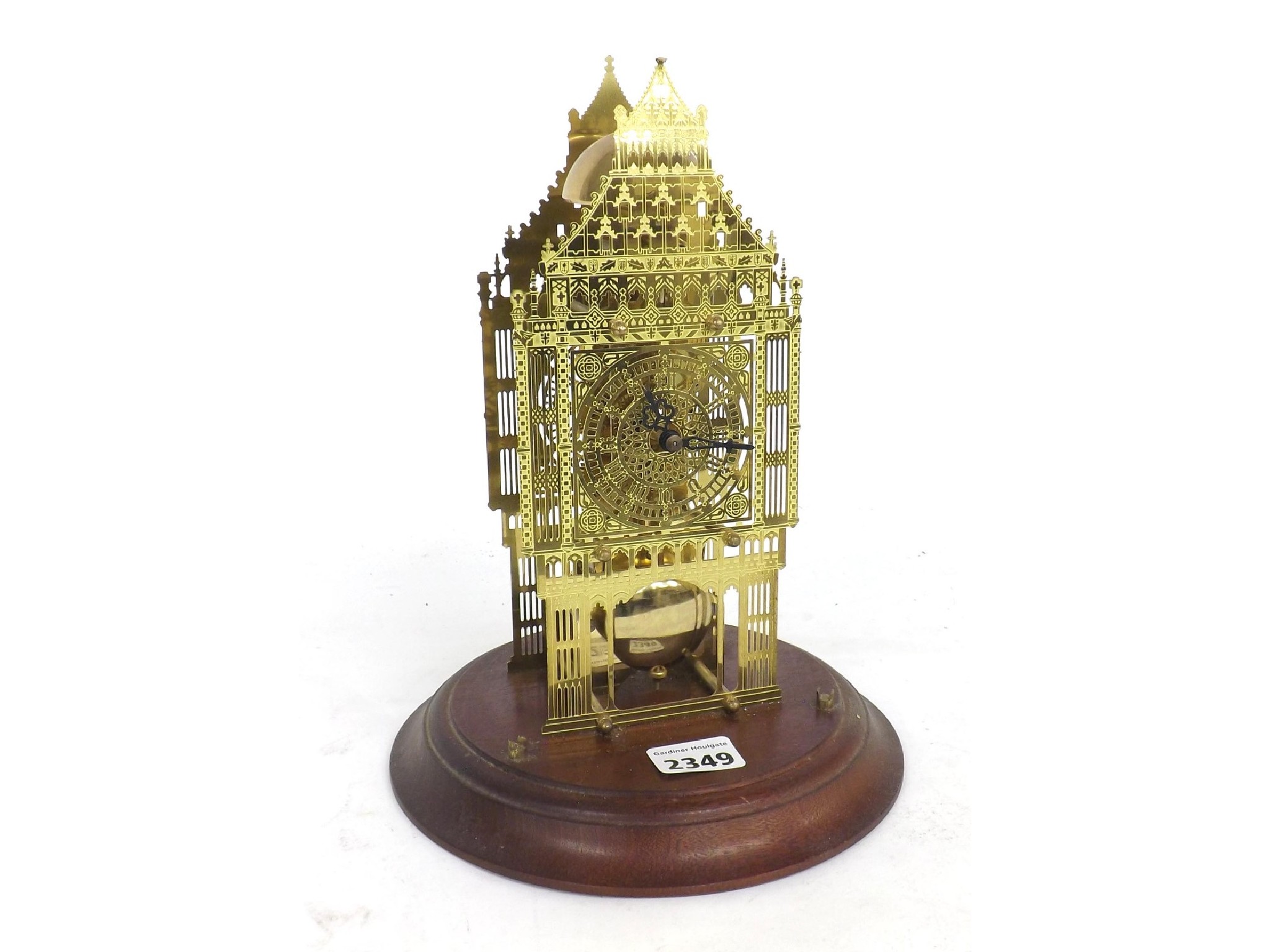 Appraisal: Contemporary brass single train skeleton clock upon a circular stepped