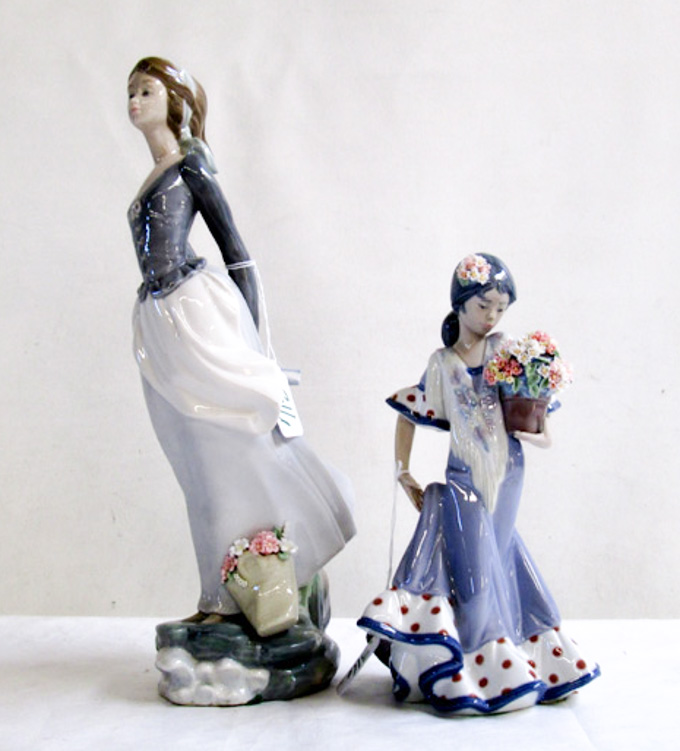 Appraisal: TWO LLADRO PORCELAIN FIGURINES Sea-Breeze sculptor Salvador Debon issued retired