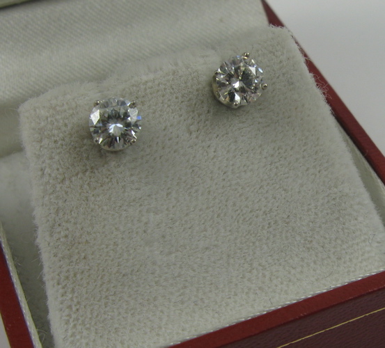 Appraisal: PAIR OF DIAMOND AND EIGHTEEN KARAT GOLD EAR STUDS each