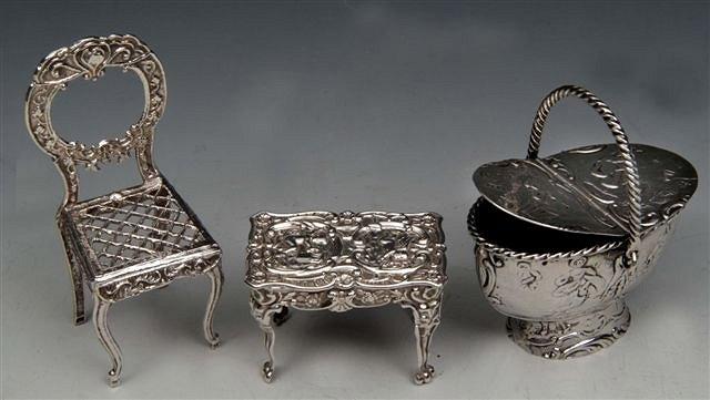 Appraisal: A DUTCH SILVER TOY 'Chair' a small toy silver table