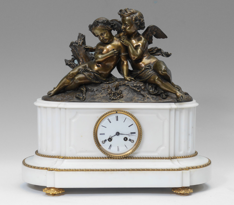 Appraisal: FRENCH BRONZE MARBLE FIGURAL CHERUB CLOCK Well executed bronze finial