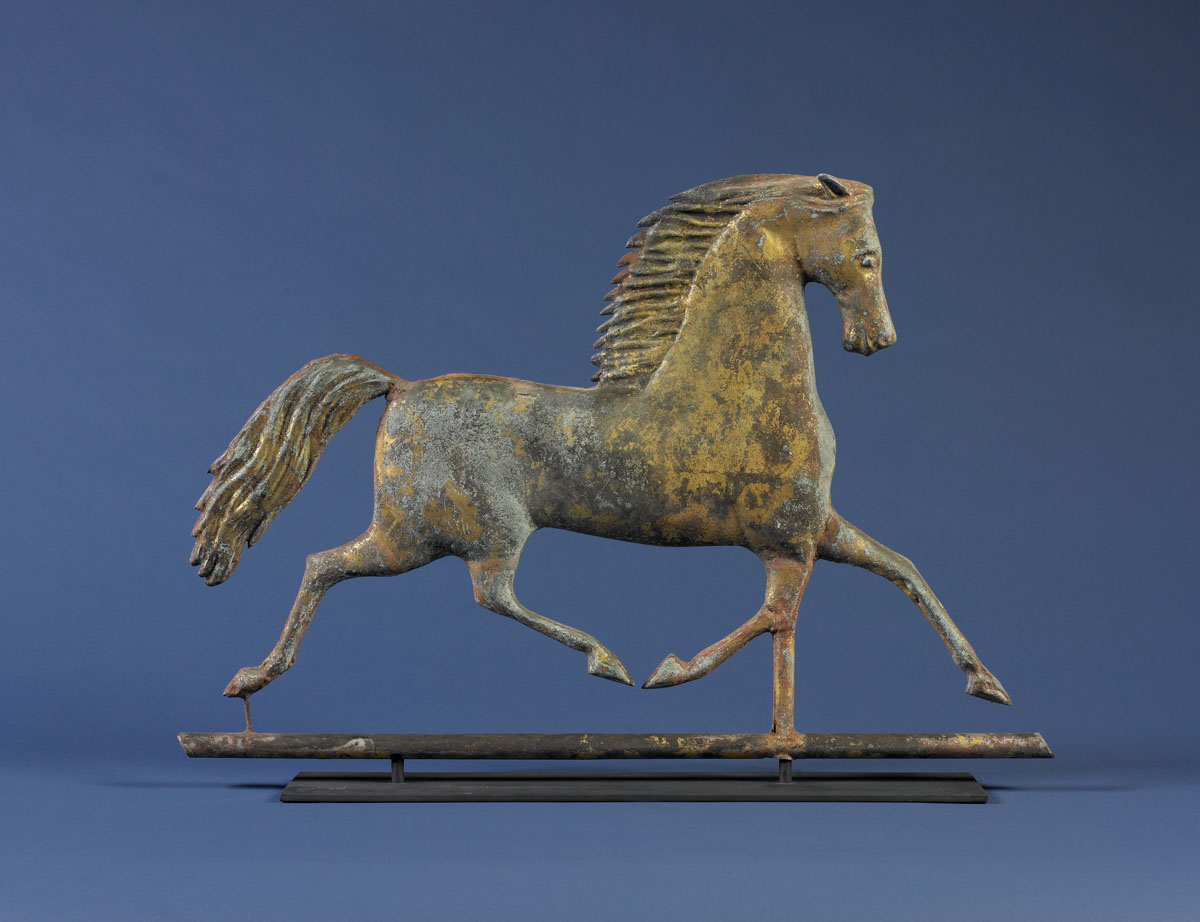 Appraisal: GILDED BLACK HAWK WEATHERVANE The mane with saw-tooth edge On