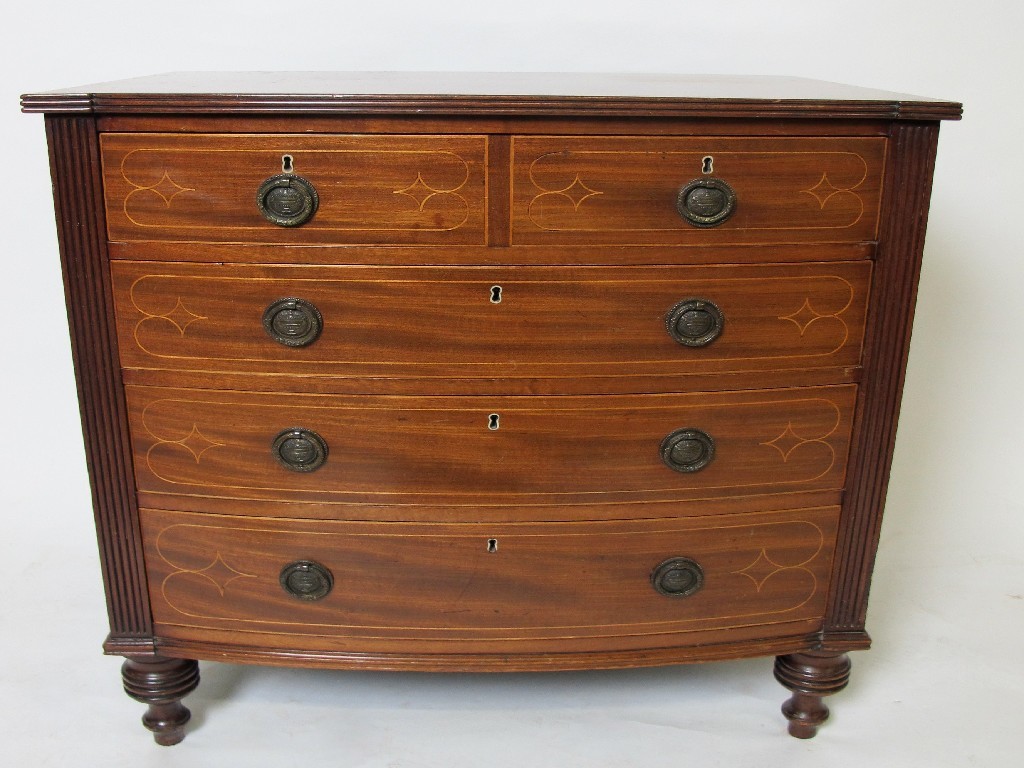 Appraisal: An Edwardian mahogany inlaid chest of drawers the Regency style