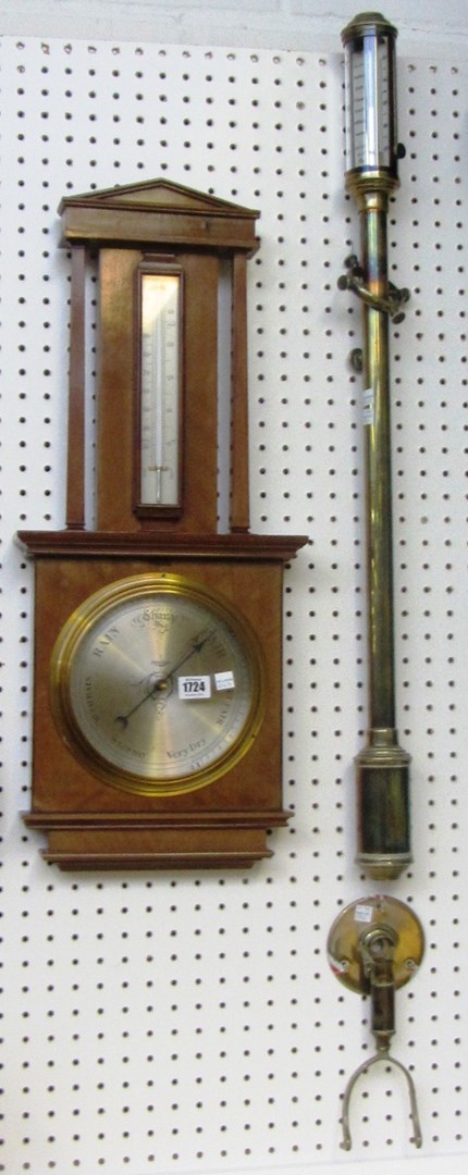 Appraisal: A mahogany cased wall barometer th century of architectural form