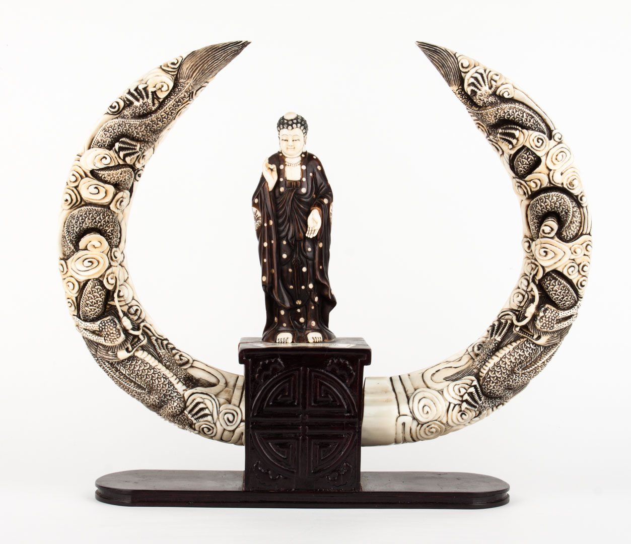 Appraisal: Japanese carved ivory and wood shrine with two elaborately carved