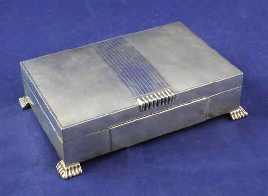 Appraisal: A 's engine turned silver cigarette box of rectangular form