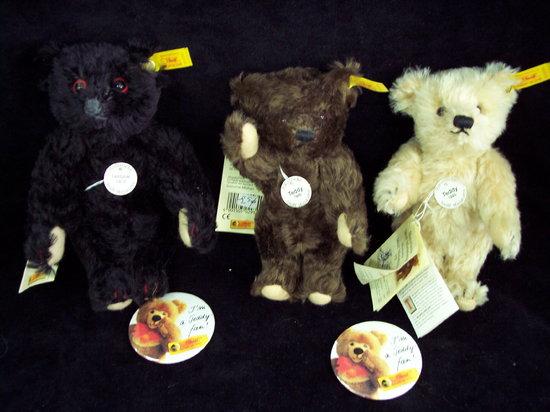 Appraisal: Additional LotThree Steiff miniature bears together with badges etc