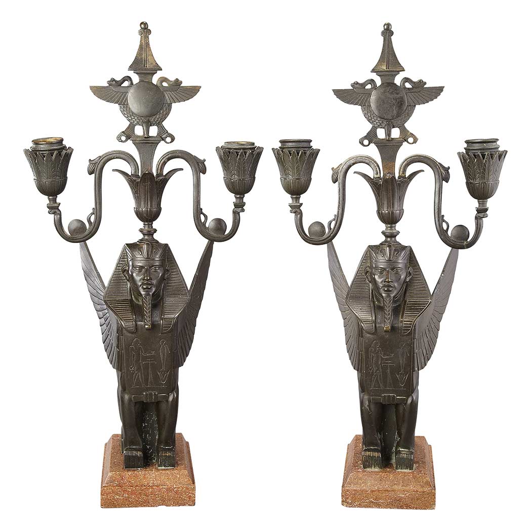 Appraisal: Pair of Egyptian Revival Bronze Two-Light Candelabra s Each with