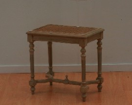 Appraisal: A Louis XVI style painted beech and caned piano stool