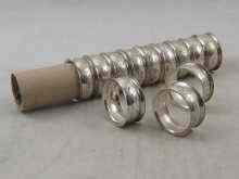 Appraisal: A set of silver napkin rings hallmarked Birmingham