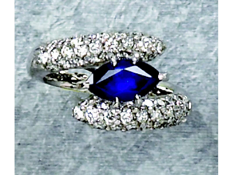 Appraisal: SAPPHIRE AND DIAMOND RING k white gold bypass pave ring