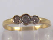 Appraisal: A carat gold three stone diamond ring size N gms