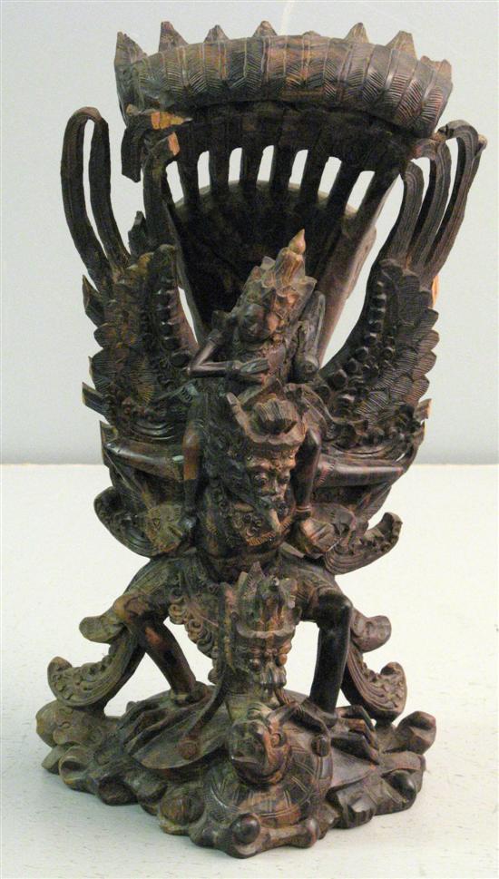 Appraisal: Malaysian indigenous wood carving of a winged beast h in