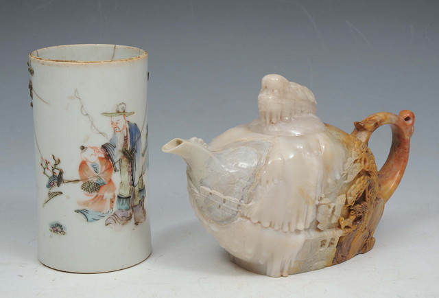 Appraisal: A CHINESE CARVED HARDSTONE TEAPOT AND COVER decorated figure in