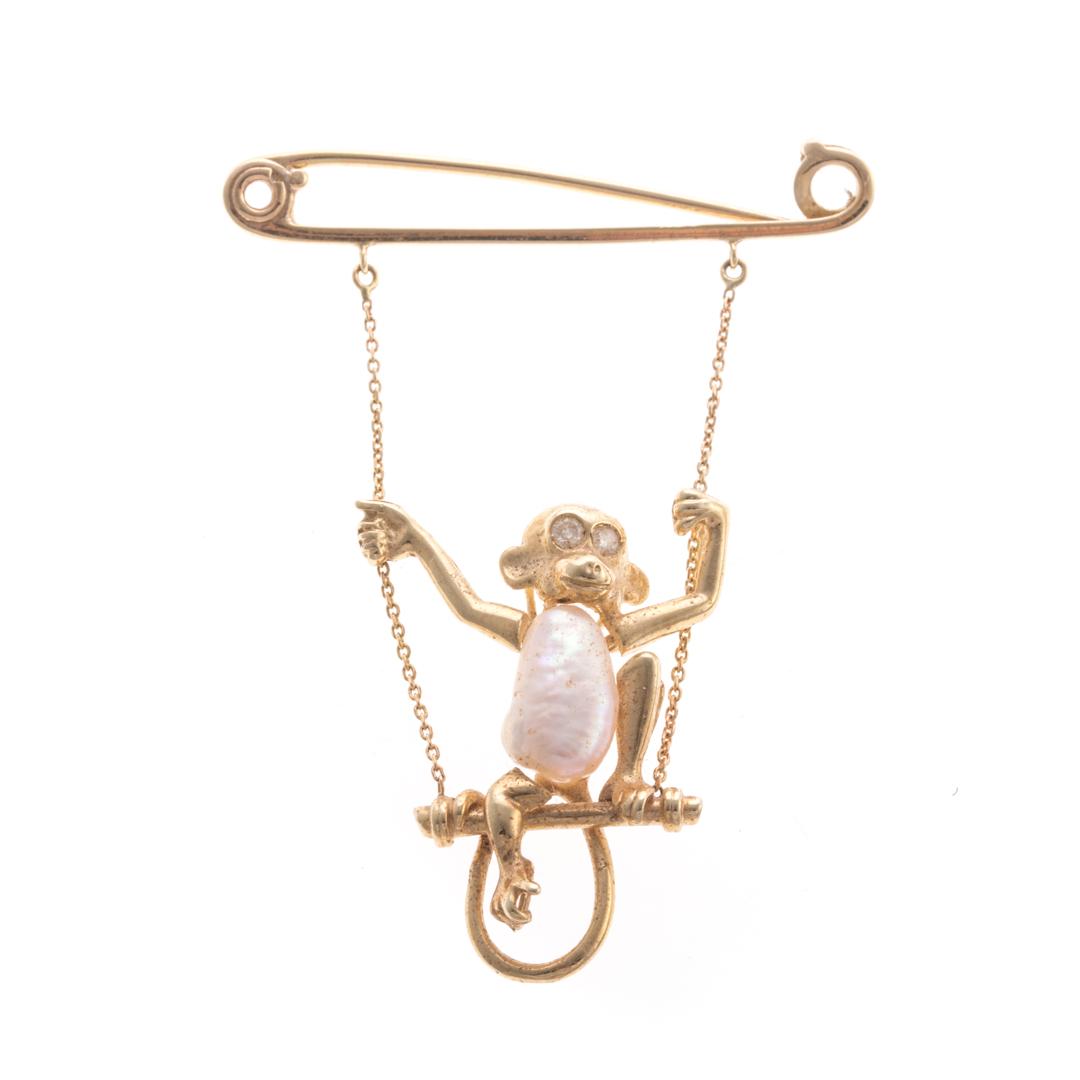 Appraisal: A Lady's K Pearl Monkey on a Swing Brooch K